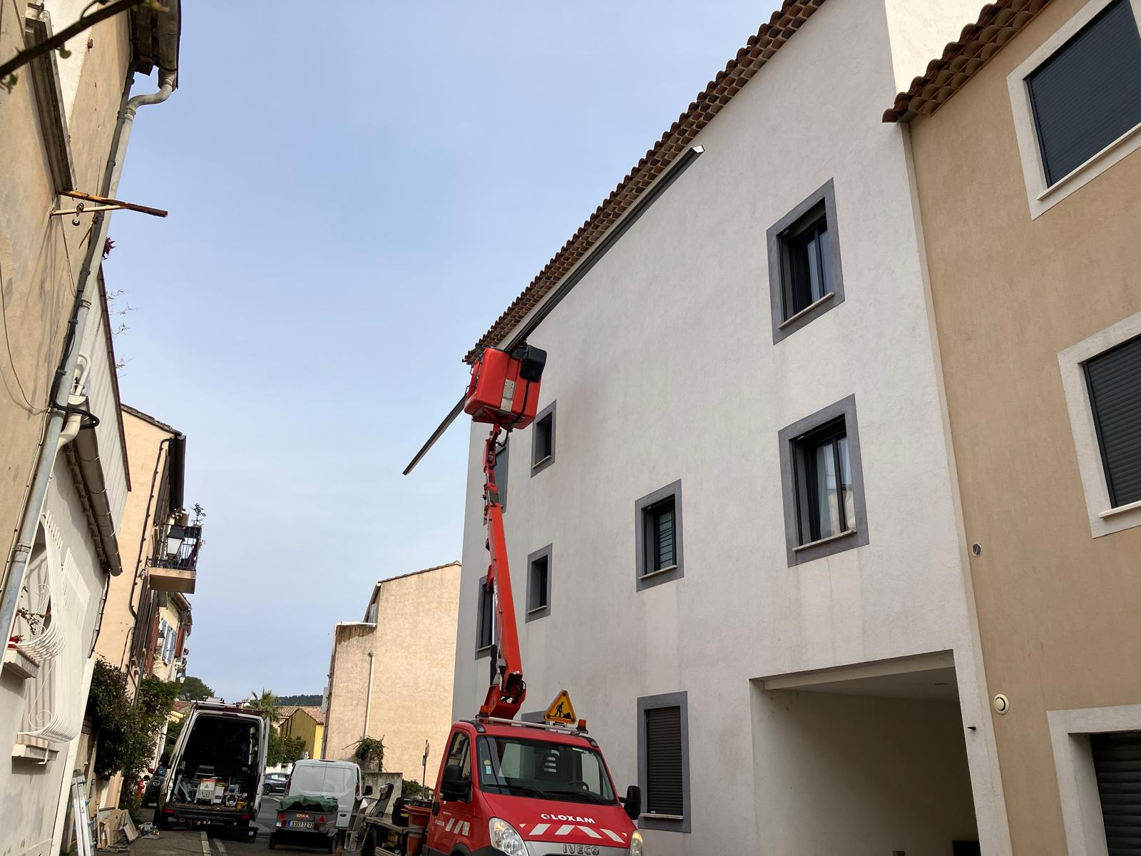 Pose de gouttière immeuble en hauteur